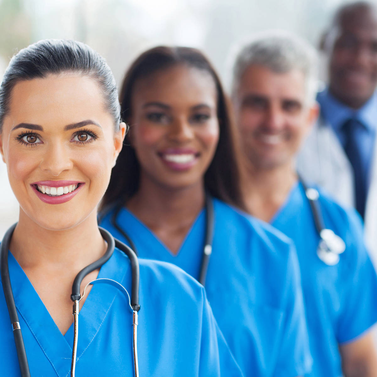 Line of smiling healthcare professionals