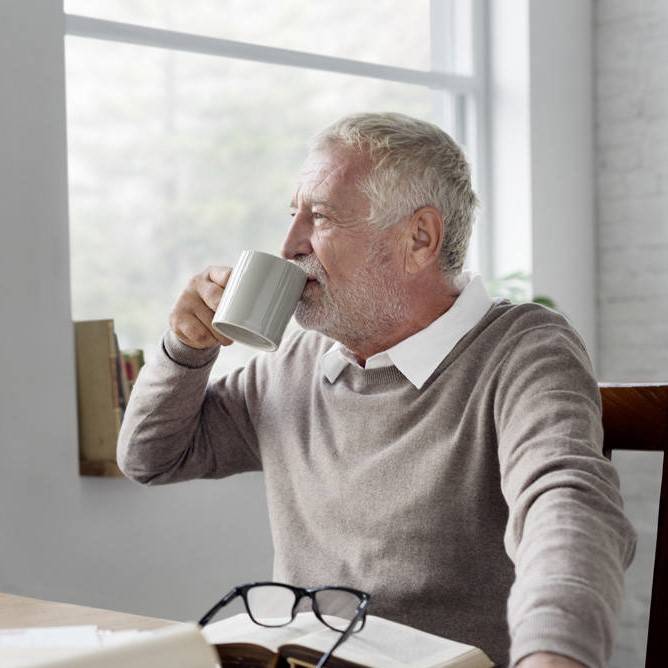 Man drinking from a cup